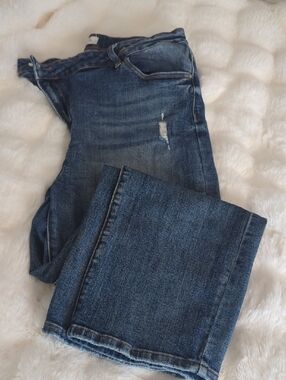 Risen Distressed Asymmetrical Cropped Blue Denim Jeans